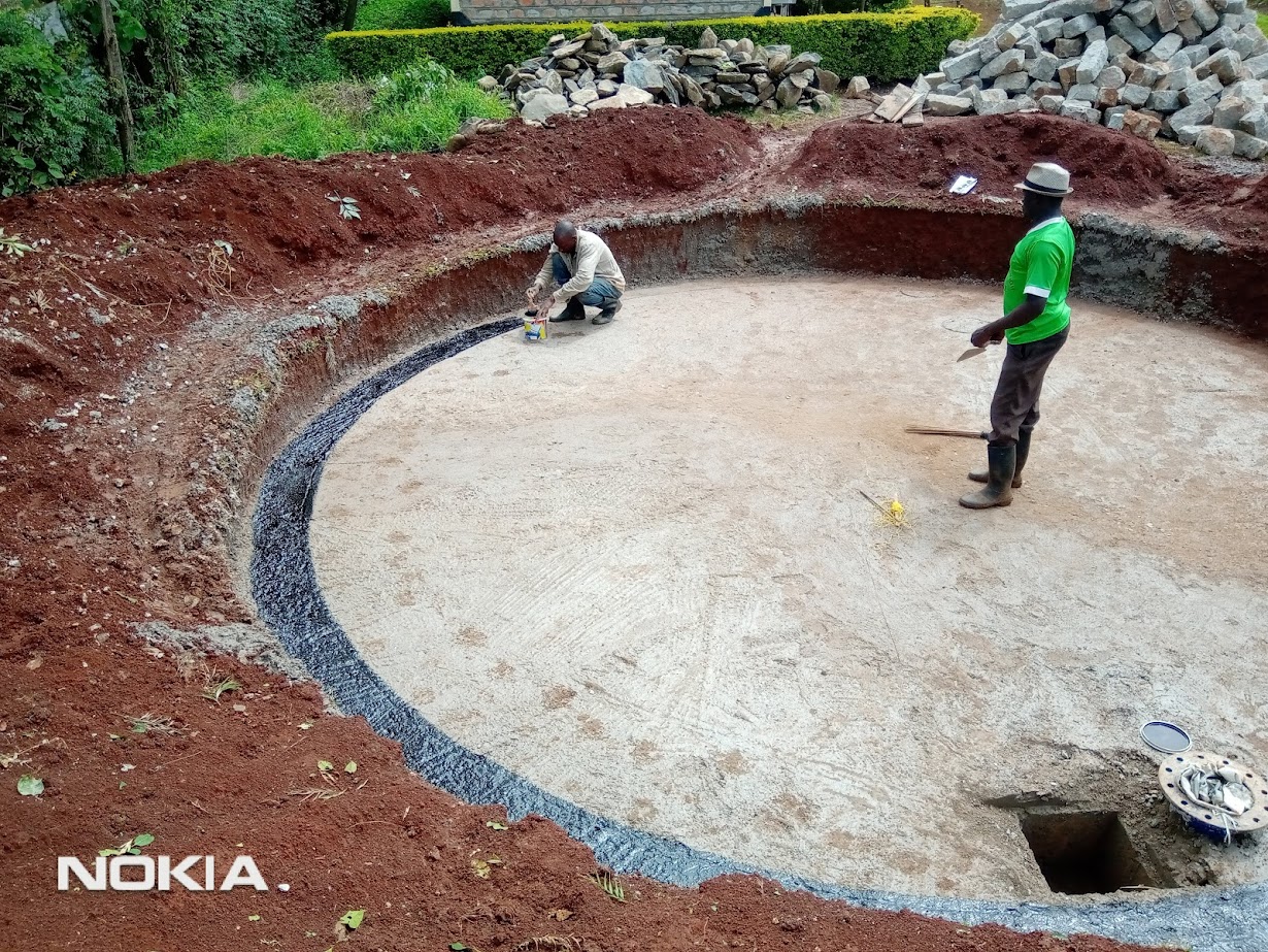 Excavation and foundation preparation for a masonry water tank