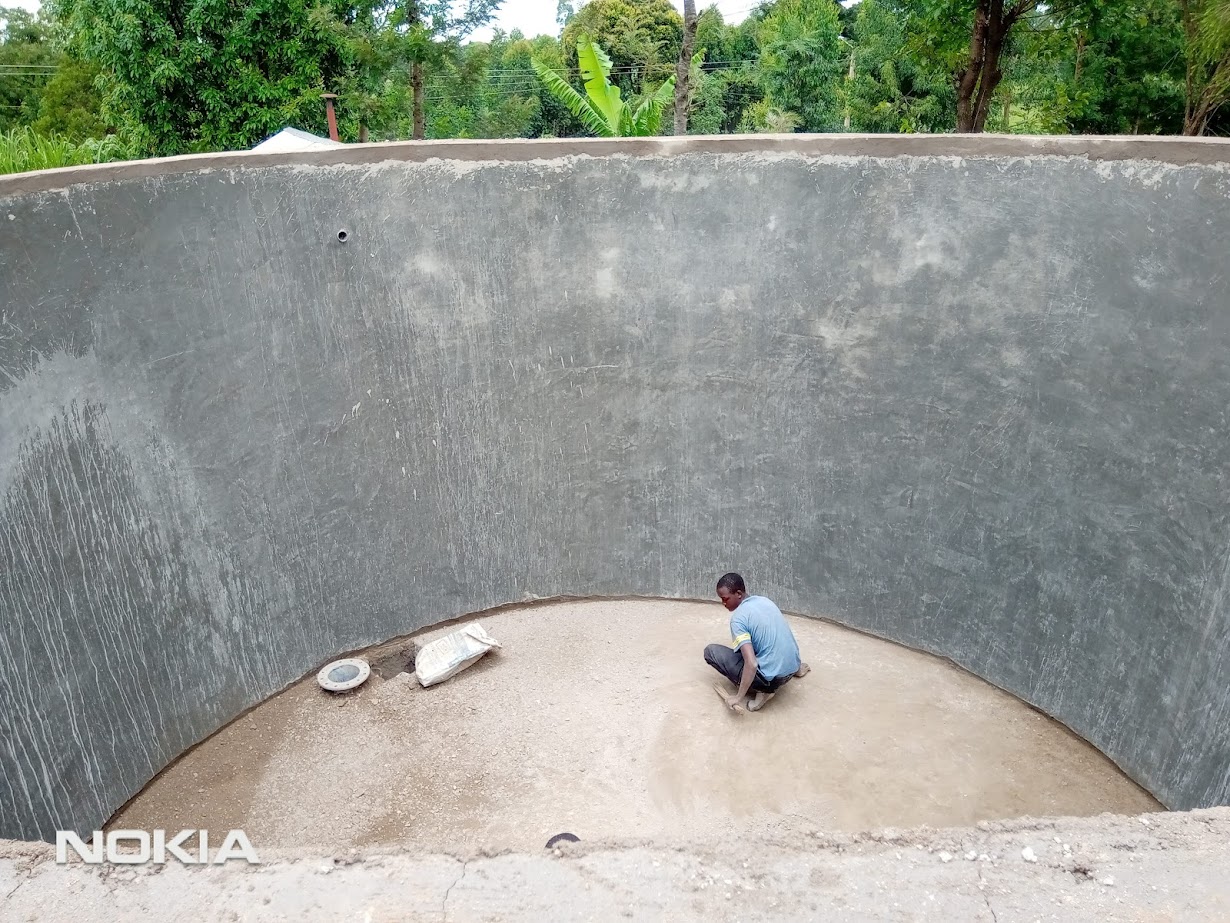 Interior plastering work inside a masonry water tank